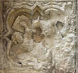 Panel 15:02 - Knight fighting with a dragon (quite eroded)